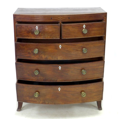 181 - A George IV mahogany and inlaid chest, of two short over three long drawers, raised on bracket feet,... 