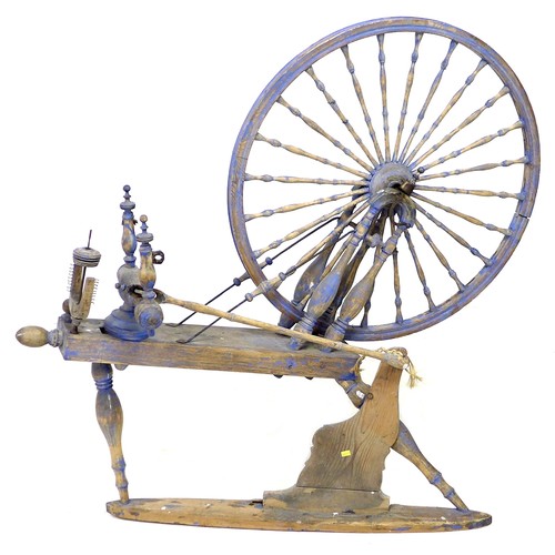 58 - A 19th century spinning wheel, painted blue, a/f, 124 by 66 by 109 cm high.