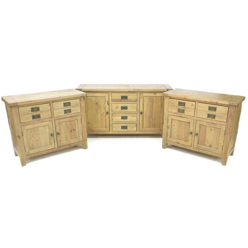 141 - Three modern pine sideboards, largest 150 by 45 by 84.5 cm high. (3)