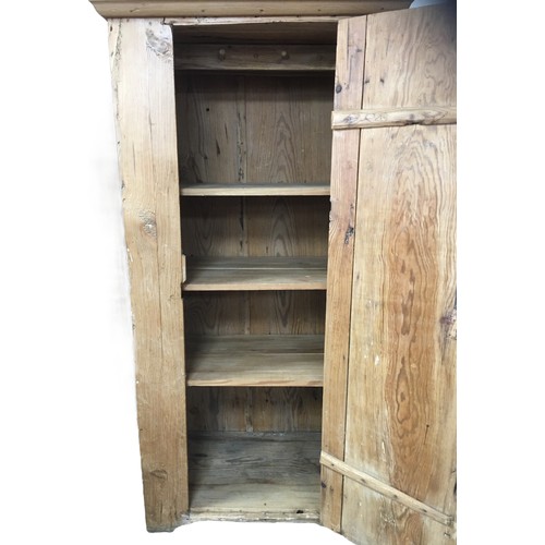 173 - An 18th century pine single door cupboard, with three shelves to its interior, 88 by 56.5 by 174.5 c... 