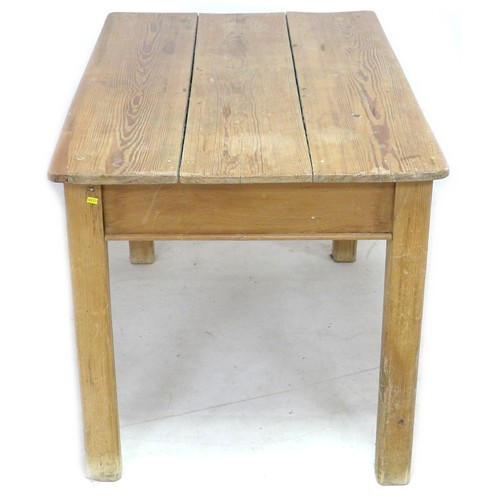 174 - A Victorian pine two drawer table, 121.5 by 75 by 73.5 cm high.