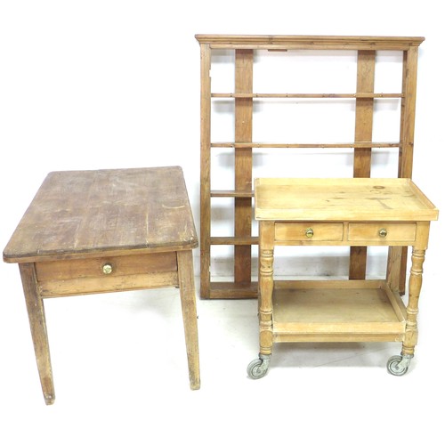 145 - A group of pine furniture, comprising a table with single drawer to one end, a trolley with single d... 