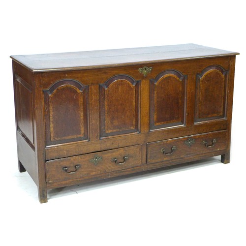 204 - A George III mahogany mule chest, four fielded panel front over two drawers with brass swan neck han... 