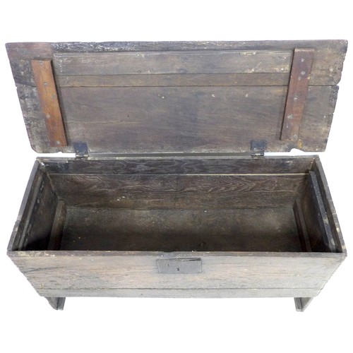 194 - A 17th century oak sword chest, metal lock plate, plain front, 114.5 by 44 by 62 cm high.