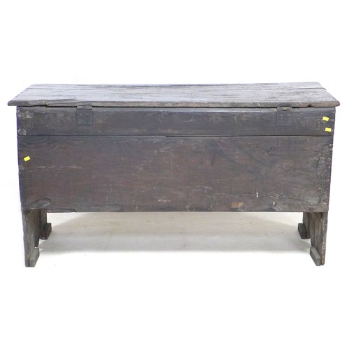 194 - A 17th century oak sword chest, metal lock plate, plain front, 114.5 by 44 by 62 cm high.