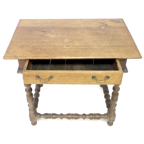 191 - A 17th century oak side table, rectangular surface, single frieze drawer, raised on turned supports ... 