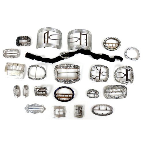 108 - A group of Georgian and later buckles, many paste set, including one large pair, one small pair, and... 