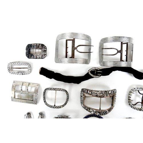 108 - A group of Georgian and later buckles, many paste set, including one large pair, one small pair, and... 