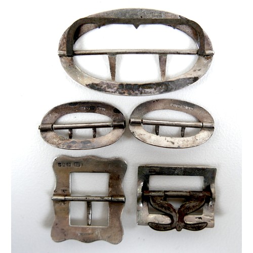 108 - A group of Georgian and later buckles, many paste set, including one large pair, one small pair, and... 