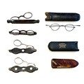 A collection of five 18th and 19th century folding spectacles, four tortoiseshell, and one white met... 