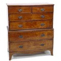 A small George III mahogany chest on chest, with two short over four graduating long drawers, cock b... 