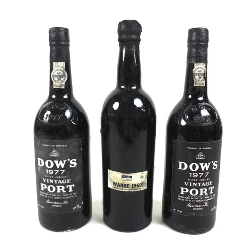 50 - Three bottles of vintage port: comprising two bottles of Dow's Silver Jubilee vintage port, 1977, an... 