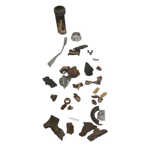 34 - Two WWII leather jerkins and assorted WWII related shrapnel, including part of a incendiary bomb tai... 