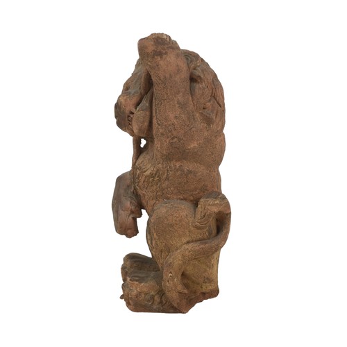20 - A 19th century terracotta lion statue, 11 by 13 by 32cm high.