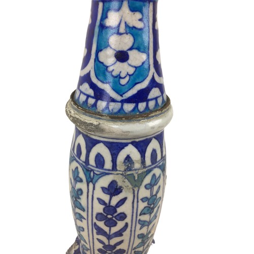36 - A Persian / Continental ceramic lamp base, wired for electricity in the early 20th century, decorate... 