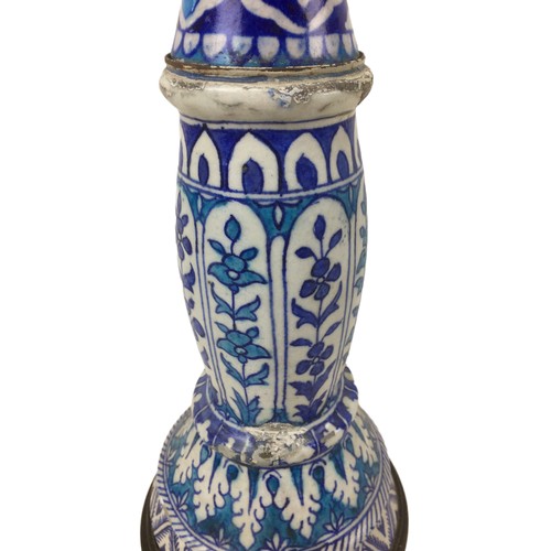 36 - A Persian / Continental ceramic lamp base, wired for electricity in the early 20th century, decorate... 