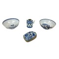 Four pieces of Chinese blue and white porcelain, 19th century and later, a lidded oblong form pot wi... 