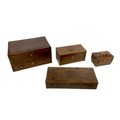 Four 19th century wooden trinket boxes and tea caddies, comprising two tea caddies a small sarcophag... 