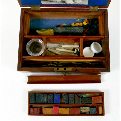 80 - An early 19th century artist's box, mahogany cased with lift lid, fitted trays, compartments, and dr... 