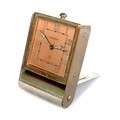 A vintage Jaeger LeCoultre travel alarm clock, with eight day movement, copper coloured Arabic dial ... 