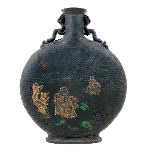 3 - A Chinese moon flask, early 20th century, black pottery with twin dragon handles, decorated in relie... 