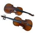 Two 19th century violins, comprising a violin bearing the label 'Joannes Baptiste Guadagnini.. fecit... 
