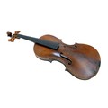 A 19th century continental violin, bearing label for 'Petrus Guarnerius Filius Joseph Cremonensis fe... 
