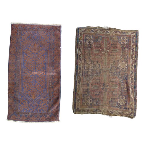 153 - Two early to mid 20th century rugs, comprising a blue ground rug, elongated hexagonal central medall... 