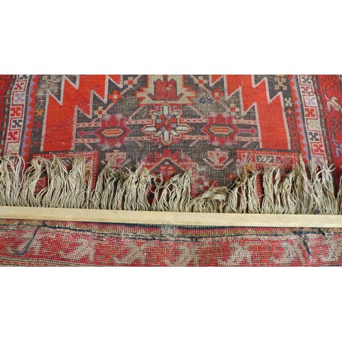 158 - Two prayer rugs, one with red ground, and diamond medallions and spandrels with serrated edge, 145 b... 