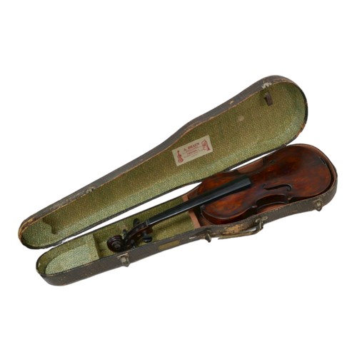 66 - A 19th century continental violin, with dark stain and a very faint label 'Carlo...', single piece m... 