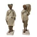 A pair of 19th century Indian Raj clay male figures, wearing traditional dress, both 25cm high overa... 