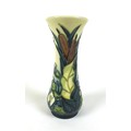 A Moorcroft Lamia vase, decorated with bulrushes and waterlilies, 13.2cm high.