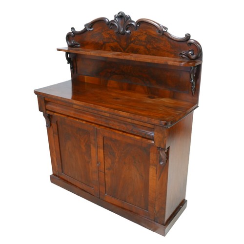 149 - A Victorian mahogany chiffonier, with double doors to its base enclosing a single shelved interior, ... 