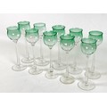 A set of ten 'Meteor' style hock wine glasses, with green tulip shaped bowls and tapering stems, bow... 