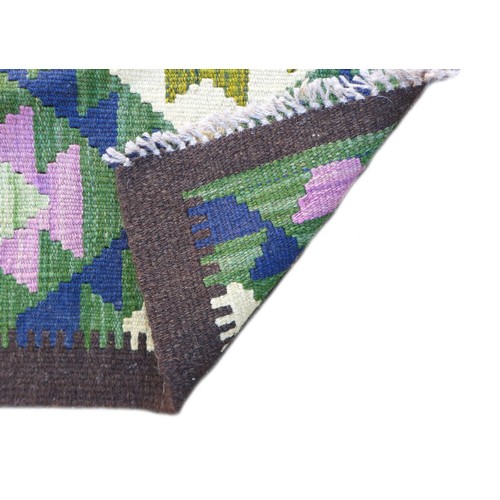 175 - A Maimana Kilim runner, with diamond patterned of blue, purple, green, and cream, encased in a brown... 