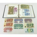 A collection of 20th century World and English bank notes, including a 100 Mark Reichsbanknote. (1 b... 