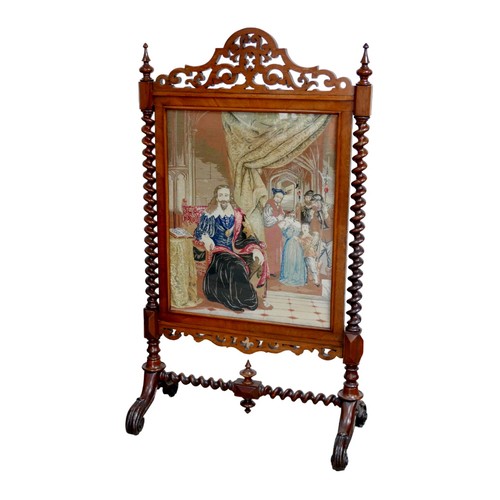 155 - A Victorian mahogany firescreen, with a tapestry of King Charles I under arrest, bearing a 20th cent... 