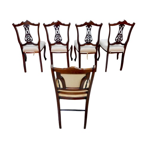 147 - A group of five 20th century mahogany chairs, including a set of four mahogany dining chairs with sh... 