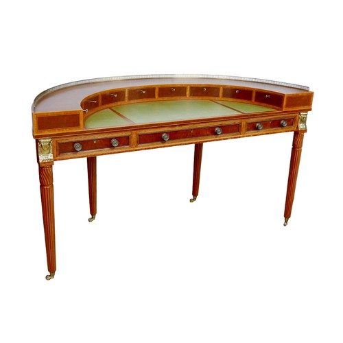 177 - A 20th century demi-lune writing desk, with gilt metal galleried top with eight small drawers above ... 