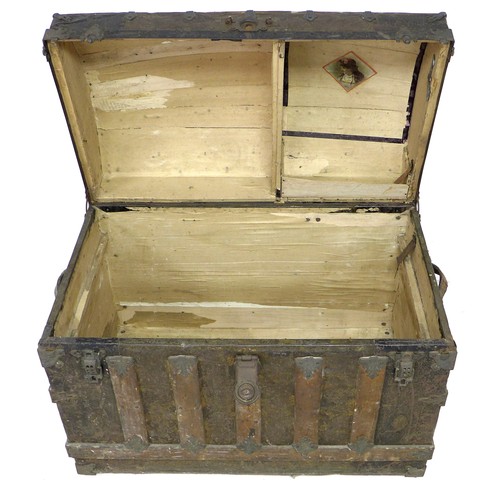 170 - A 20th century dome topped storage chest, with wooden supports and embossed with metal decorative ap... 