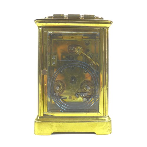 92 - A 20th century brass carriage clock, with enamel dial and Roman numerals, blued steel hands, five gl... 