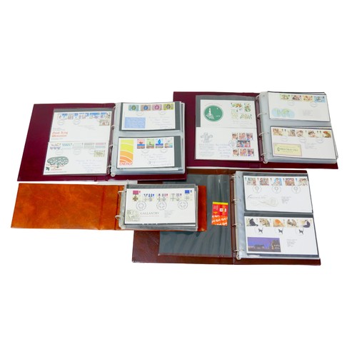 75 - A collection of First day covers, in four albums, spanning 1973 to 1997. (1 box)