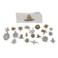 A collection of twenty-one British army cap badges,  together with assorted coins and tokens, includ... 