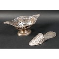 A late Victorian novelty silver hanging wall pocket, in the form of a slipper, with embossed floral ... 