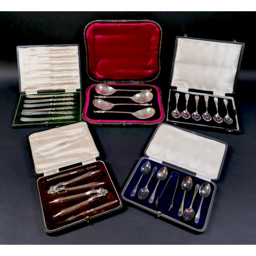 53 - A cased set of four George V silver apostle serving spoons, Wakely & Wheeler, London 1911, each 19cm... 