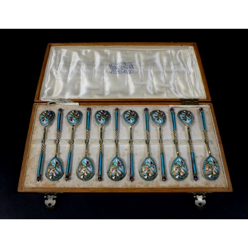 50 - A cased set of pre-revolution Russian enamelled teaspoons, with polychrome enamel decoration and gil... 