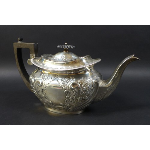 58 - A Victorian three piece silver tea set, comprising a teapot, 27 by 11 by 15.5cm high,milk jug and su... 