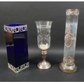 Two silver and white metal mounted glass vases, comprising a blue glass rectangular form vase with p... 