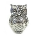 A white metal owl figurine, possibly stamped '925', 1.95toz, 6 by 6 by 9cm high.