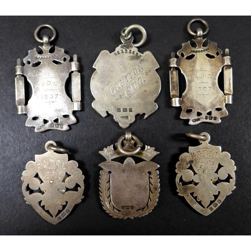 20 - A collection of Victorian and early 20th century silver fobs, together with some Victorian and later... 